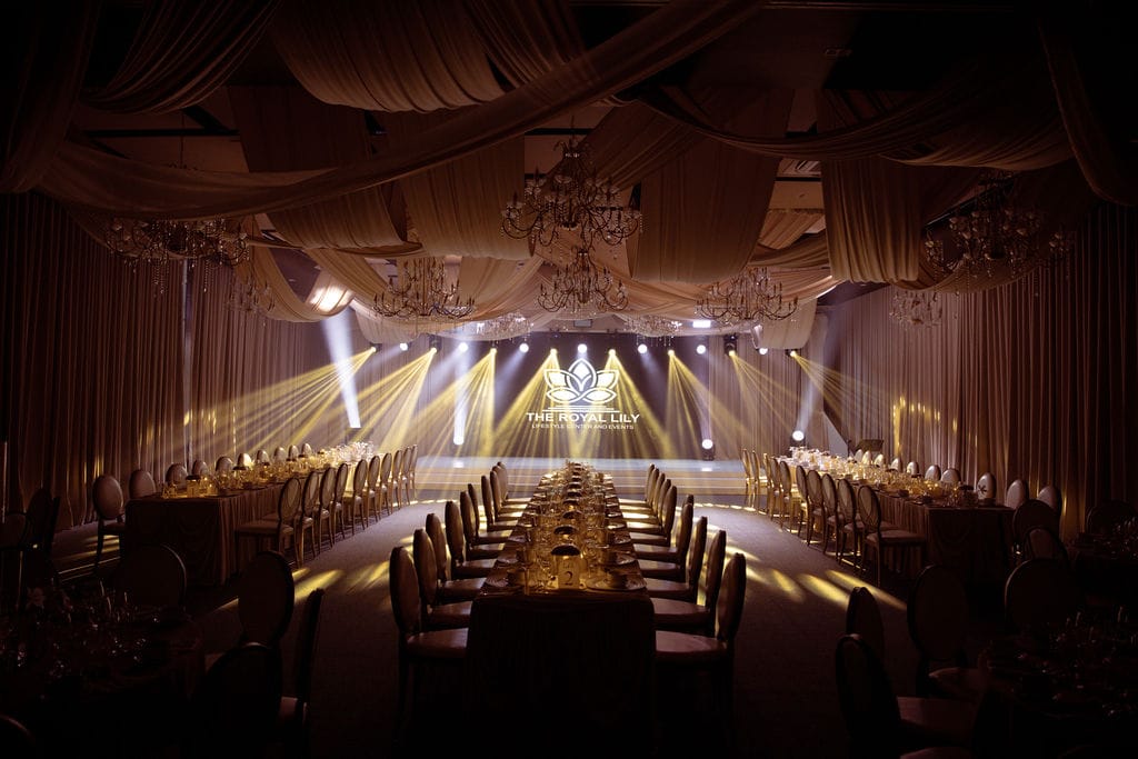Presidential long table facing the stage